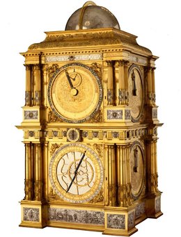 reich verzierte, goldene Uhr mit mehreren Ziffernblättern
